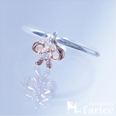 チャームが揺れる リング プチリボン ピンクゴールドカラー スイング ドロップ ホワイトキュービックジ..