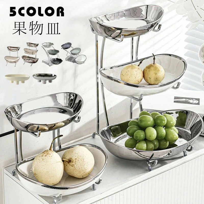 商品情報製品説明： この多層ヨーロピアンスタイルのフルーツプレートは、クラシックなヨーロッパデザインで、層を重ねた構造がスペースを節約しながら、テーブルに優雅で高貴な雰囲気を演出します。さまざまなフルーツやデザート、キャンディを置くのに適しており、実用的で装飾的な要素を兼ね備えた理想的な選択肢です。家庭の集まりや日常使いに最適で、テーブルに華やかさとファッション感を加えます。製品説明： 多層デザインにより、このフルーツプレートは、より多くの種類のフルーツを飾るだけでなく、視覚的な効果も高め、テーブルにメリハリのあるディスプレイを作り出します。ヨーロピアンスタイルの彫刻のディテールとモダンな要素が融合し、クラシックな美しさを保ちながら、現代のインテリアトレンドにもマッチしています。祝日のギフトや宴会の装飾品としても最適で、食事体験を向上させる完璧な選択です。製品説明： 高貴でエレガントなデザインで、祝日や結婚式などにぴったりです！製品説明： 実用性と装飾性を兼ね備えた、テーブルのハイライトに！使用のヒント： 上層に重い物を置かないようにし、トレイの転倒や構造の損傷を防ぎましょう。保管のヒント： 長期間使用しない場合は、プレートを分解して保管し、ほこりの蓄積が使用に影響を与えないようにしましょう。商品情報製品説明： この多層ヨーロピアンスタイルのフルーツプレートは、クラシックなヨーロッパデザインで、層を重ねた構造がスペースを節約しながら、テーブルに優雅で高貴な雰囲気を演出します。さまざまなフルーツやデザート、キャンディを置くのに適しており、実用的で装飾的な要素を兼ね備えた理想的な選択肢です。家庭の集まりや日常使いに最適で、テーブルに華やかさとファッション感を加えます。製品説明： 多層デザインにより、このフルーツプレートは、より多くの種類のフルーツを飾るだけでなく、視覚的な効果も高め、テーブルにメリハリのあるディスプレイを作り出します。ヨーロピアンスタイルの彫刻のディテールとモダンな要素が融合し、クラシックな美しさを保ちながら、現代のインテリアトレンドにもマッチしています。祝日のギフトや宴会の装飾品としても最適で、食事体験を向上させる完璧な選択です。製品説明： 高貴でエレガントなデザインで、祝日や結婚式などにぴったりです！製品説明： 実用性と装飾性を兼ね備えた、テーブルのハイライトに！使用のヒント： 上層に重い物を置かないようにし、トレイの転倒や構造の損傷を防ぎましょう。保管のヒント： 長期間使用しない場合は、プレートを分解して保管し、ほこりの蓄積が使用に影響を与えないようにしましょう。