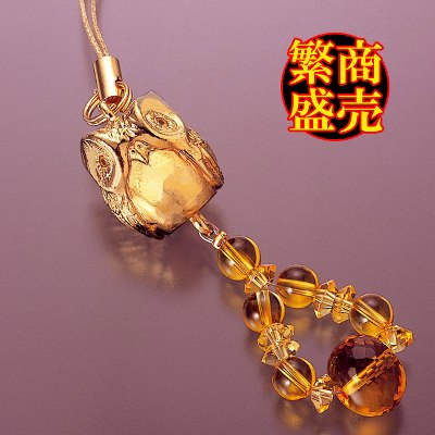 幸福を運ぶ鳥＆風水 幸福と金財運を招くストラップ【規格】梟パーツ1個（25×17×16mm 真鍮）、黄水晶1個（12×9mm/カット）、5個（6mm珠）、7個（6×3mm/カット）[サイズ]約11.5cm[重量]約13g[中糸]ステンレスワイヤー[付属品]専用巾着袋[個装サイズ]縦13.8×横8.5×高さ1.5（cm）/18.0（g）