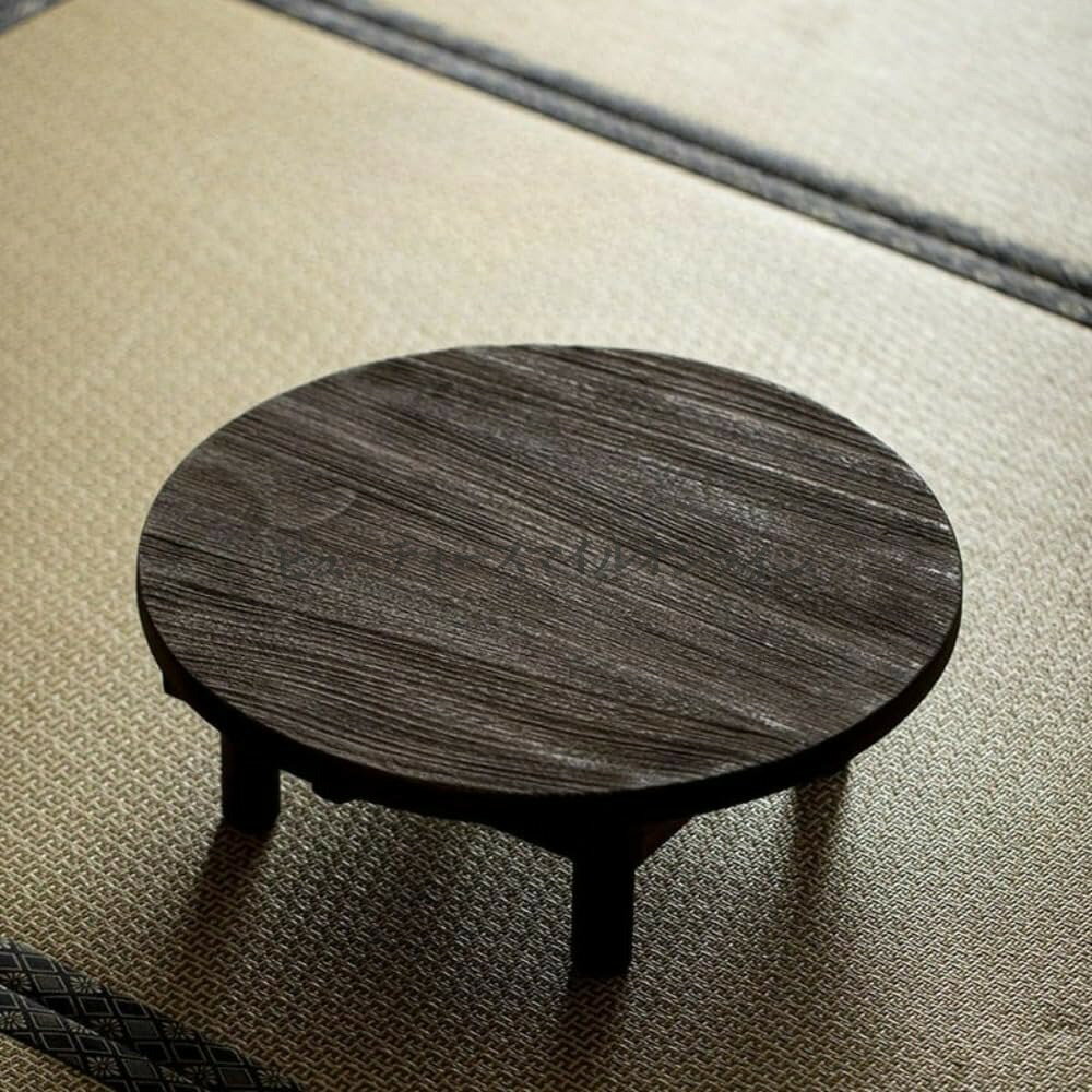 【商品名】折りたたみ式 木製 丸ちゃぶ台 ほぞ継ぎ仕様で耐久性抜群 省スペースでも高級感溢れる リビングルームや畳の間で使える アフタヌーンティー 食事会に最適なスタイリッシュデザイン【価格】19084円【商品説明】【商品名】丸ちゃぶ台 、木製、折りたたみ式、耐久性があり、ほぞ継ぎ、リビングルーム、スタイリッシュでシンプル、畳、アフタヌーンティーや食事に最適【価格】19084円【商品説明】滑らかな手触りと快適な使い心地：天板のエッジとディテールは、滑らかで丸みを帯びた手触りを実現。バリや刺激のない、快適な使い心地を実現。使うたびに心地よく、安心してお使いいただけます。収納に便利な巧みな折りたたみ設計：テーブルの脚は柔軟で折りたたみやすく、スリムな形状に折りたたむことができるため、収納や持ち運びに非常に便利です。狭いスペ侘び寂びの魅力、コンパクトで多用途：直径41cm、高さ14cmのこの美しい円形テーブルは、侘び寂びの美しさを体現するチャコールブラックとウォルナットの2色からお選びいただけます。軽量設計なので、畳、出窓、茶器、さらにはカンのヘッドボードなど、様々な場所に簡単に設置でき、落ち着いた空間を演出します。希少なチーク材、アンティークなエレガンス：貴重なビルマ産チーク材を使用し、アンティークウォルナット仕上げを施したこのテーブルは、自然な滑らかな質感と温かみのある素朴な色合いを誇り、時代を超え【商品名】折りたたみ式 木製 丸ちゃぶ台 ほぞ継ぎ仕様で耐久性抜群 省スペースでも高級感溢れる リビングルームや畳の間で使える アフタヌーンティー 食事会に最適なスタイリッシュデザイン【価格】19084円【商品説明】【商品名】丸ちゃぶ台 、木製、折りたたみ式、耐久性があり、ほぞ継ぎ、リビングルーム、スタイリッシュでシンプル、畳、アフタヌーンティーや食事に最適【価格】19084円【商品説明】滑らかな手触りと快適な使い心地：天板のエッジとディテールは、滑らかで丸みを帯びた手触りを実現。バリや刺激のない、快適な使い心地を実現。使うたびに心地よく、安心してお使いいただけます。収納に便利な巧みな折りたたみ設計：テーブルの脚は柔軟で折りたたみやすく、スリムな形状に折りたたむことができるため、収納や持ち運びに非常に便利です。狭いスペ侘び寂びの魅力、コンパクトで多用途：直径41cm、高さ14cmのこの美しい円形テーブルは、侘び寂びの美しさを体現するチャコールブラックとウォルナットの2色からお選びいただけます。軽量設計なので、畳、出窓、茶器、さらにはカンのヘッドボードなど、様々な場所に簡単に設置でき、落ち着いた空間を演出します。希少なチーク材、アンティークなエレガンス：貴重なビルマ産チーク材を使用し、アンティークウォルナット仕上げを施したこのテーブルは、自然な滑らかな質感と温かみのある素朴な色合いを誇り、時代を超え