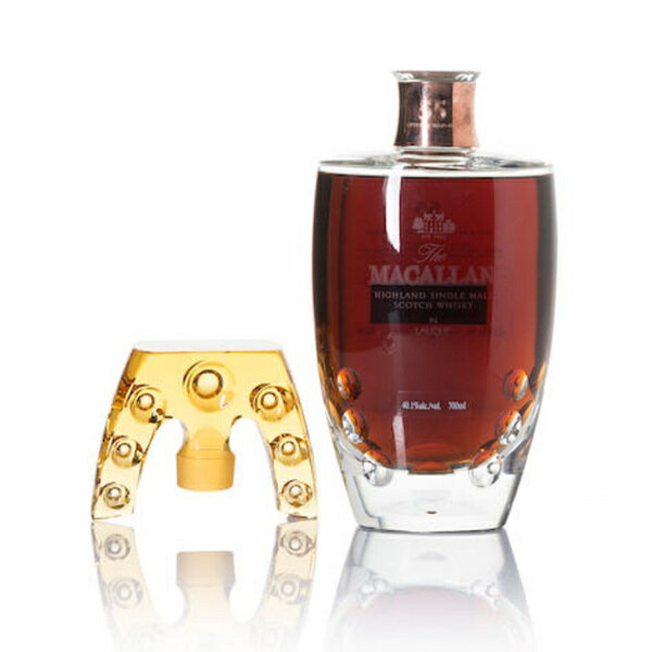 Macallan 55 Year Old Lalique / マッカラン 55年 ラリック . The Macallan distillery was founded by Alexander Reid, a barley farmer and teacher. The original name of the area was 'Maghellan', which came from the Gallic word 'magh', which means fertile soil, and 'Ellan', from the monk St Fillan, which was closely related to the church that stood in the grounds of The Macallan Estate until 1400. Farmers had already been making whisky on their Speyside farms for several centuries. Released in 2007, this is the second decanter in a highly limited, exclusive Macallan collaboration with crystal makers, Lalique. The series is called The Six Pillars collection, and saw 6 decanters released over an eleven year period, each celebrating one of the six facets that Macallan believe set them apart from Scotland's other distilleries.70cl/40,1% Fine and Rareは希少な格付けワイン、シャンパンやスピリッツを中心に取り扱っており、お客様にぴったりの商品をご案内致します。また、安心してご利用いただくために主にヨーロッパのシャトーやドメーヌなど、信頼性の高い生産者より商品を買い付けております。不良や異常のある場合は商品のお届けから8日以内にFine and Rareまでお知らせくださいませ。Fine and Rare specializes in fine and rare wines, champagne and spirits, exactly the kind of products you are looking for, our sources are mainly Châteaux and Domains, private wine cellars and other reliable wine companies in Europe to ensure the authenticity of our wines, Fine and Rare must be notified of any defects or irregularities no later than 8 days after the collection of the receipt of the goods. 1