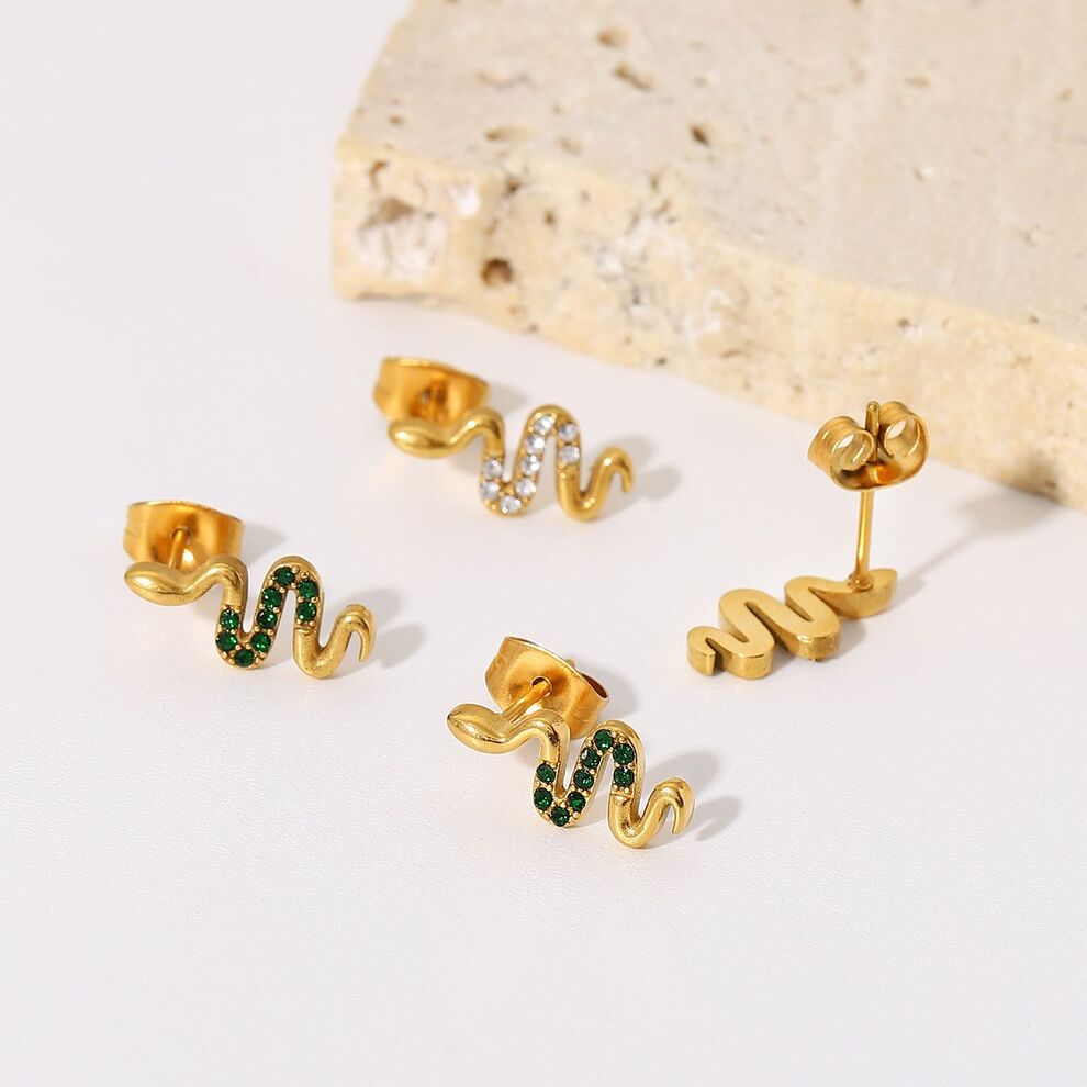 【送料無料】 ピアス 動物 アニマル 白 ホワイト ジルコニア ステンレス ゴールド レディース 女性 デイリー ツイスト 蛇 スネイク ヘビ 形 シェープ 象...