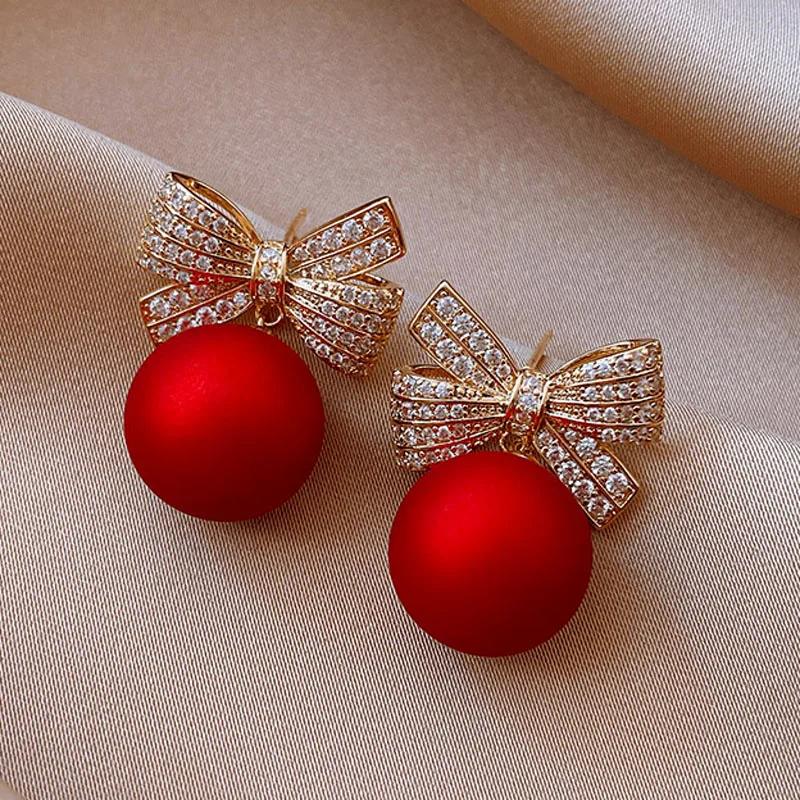 【送料無料】 ピアス 赤 レッド ゴールド パール 揺れる レディース カラー トレンド イミテーション ダングル CZ 弓 クリスマス ギフト ファッション ...