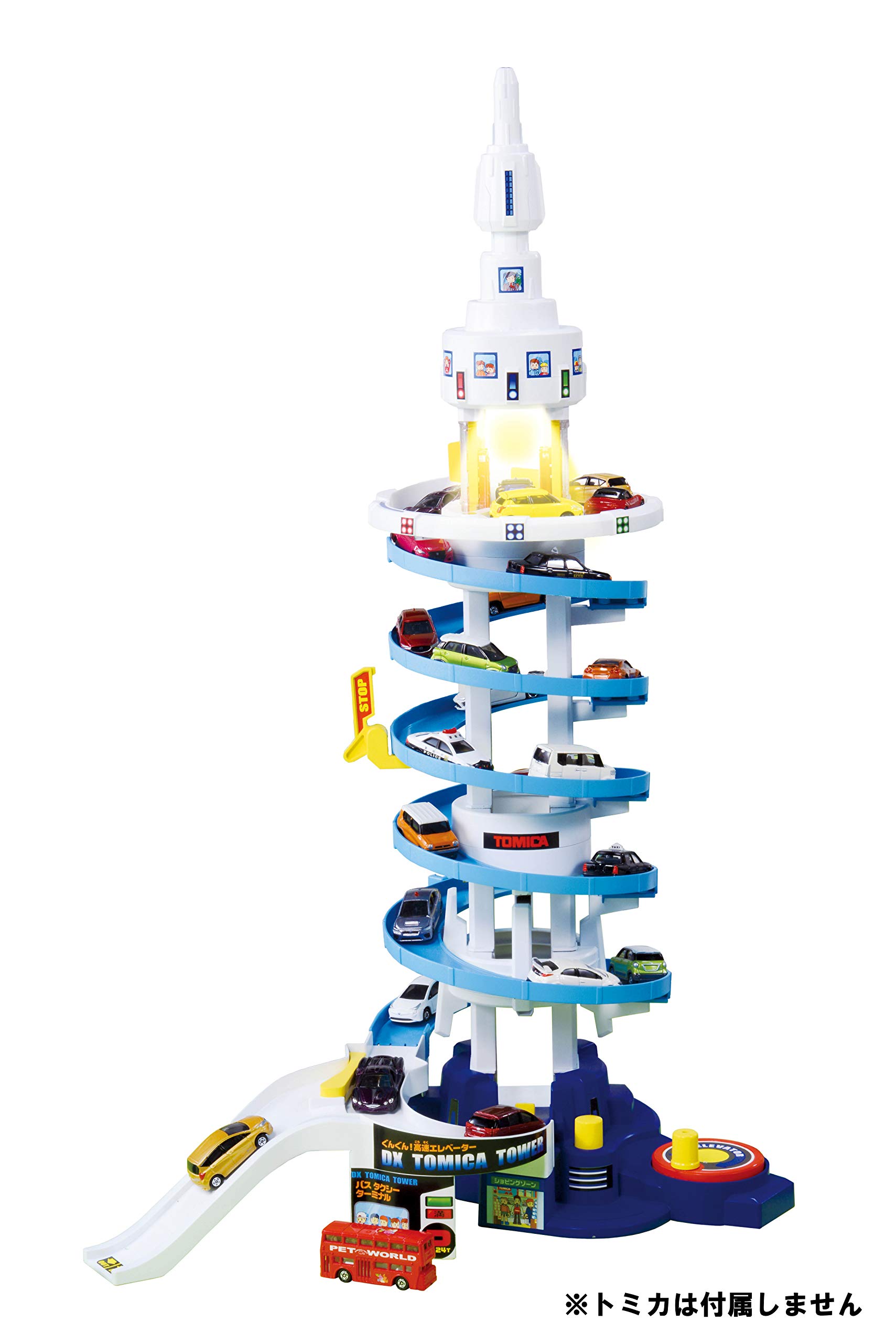 (C) TOMY 対象年齢:3才以上 単4形アルカリ乾電池3本使用(別売)) 全高80cmの超ドデカいトミカのタワー。 スパイラルスカイスロープから迫力のトミカ一斉走行。