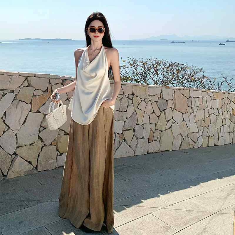 ・カラー展開: 杏色・サイズ展開: S、M、L、XL・主な素材: ポリエステル50%以上・スタイル: リゾート・スカート丈: ミドルレングス・袖丈: ノースリーブ・パターン: 無地・セットタイプ: ドレスセット・商品カテゴリ: カジュアルセット