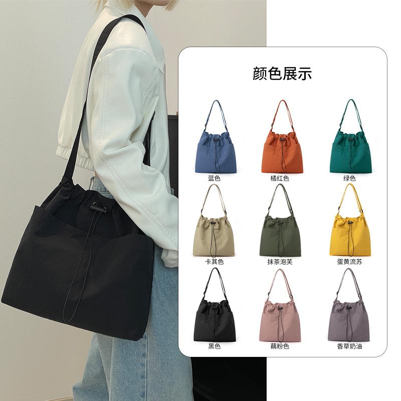 斜めがけバッグ 女性用 ナイロン 軽量 ファッション 韓国風 気質 大容量 ショルダーバッグ 通勤 通年 縦型 方形 中サイズ ミディアム ソフト シングルストラップ 日常使い クロスボディ ハンドバッグ クロスオーバー 携帯ポケット ステッチ デイリー
