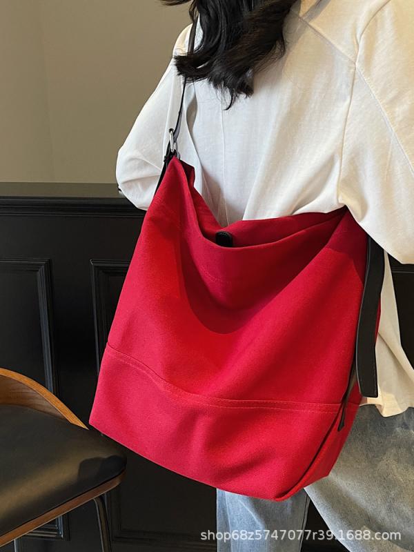 トートバッグ 女性用 大容量 帆布 縦型 方形 黒 ブラウン ピンク ワインレッド 都市 シンプル ファッション 韓国風 通勤 斜め掛け 日常使い 肩掛け 携帯ポケット ミディアム硬度 オープン シングルストラップ キャンバス内張り ステッチ 春季 軽量