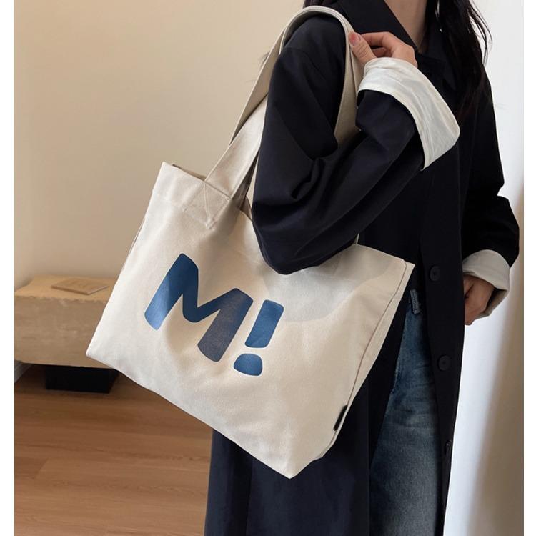 Rakuten - トートバッグ メンズ 女性用 帆布 キャンバス 中型 縦型 方形 黒 キャメル アイボリー 都市 シンプル ミニマム 字母 ロゴ プリント 磁扣 ソフト ナイロン 裏地 ジップポケット 携帯ポケット ショルダーストラップ ダブル 日常 通勤 普段使い 軽