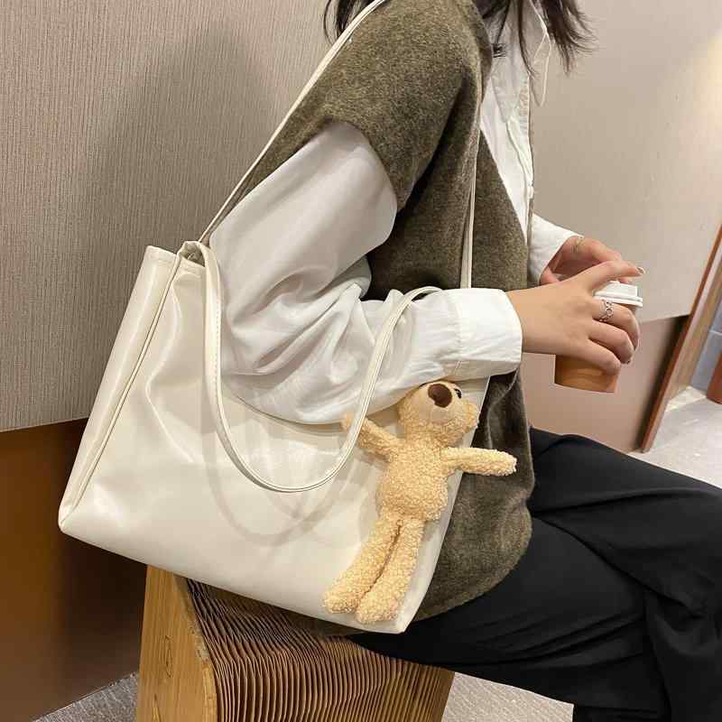 ・カラー展開: 白色、黒色、红色・スタイル: 街頭潮流・主な素材: PU・形状: トートバッグ・サイズ: 大・流行要素: 車縫線、拼接・裏地素材: ポリエステル・形状詳細: 縦型方形・開閉方式: 磁扣・内部構造: 携帯電話ポケット・硬度: 中・外ポケット: 内貼袋・肩紐本数: 2本・使用シーン: 日常搭配