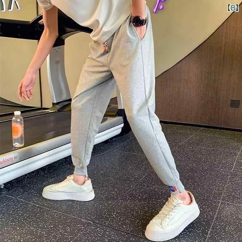 メンズ ハーレムパンツ 九分丈 束脚 コーンパンツ ミッドライズ ドローストリング ウエスト ソリッドカラー ポリエステル混 黒 グレー 日常使い カジュアル フィットネス 春夏 通年 軽量 ゆったりシルエット ストレッチなし 青年向け ストリートスタイ