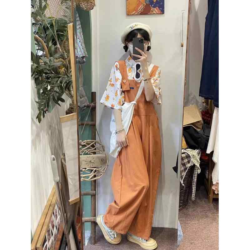 レディース 背広パンツ コットン 素材 九分丈 ハイウエスト ストラップ デザイン ポケット 付き ルーズ フィット ワイドレッグ シルエット 気質 通勤 スタイル 都市 カジュアル 秋 シーズン オレンジ カラー トップス ブラック ボタン アクセント