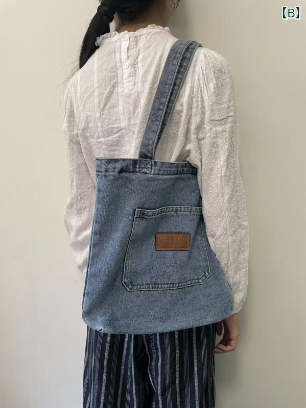フォークBRのバケツ型 デニム トートバッグ 女性用 通勤 日常使い シングルショルダー 軽量 肩掛け 大学生 学生用 バックパック 都市 シンプル ミディアムサイズ ステッチ ジップ開閉 携帯ポケット ソフト 中間硬度 ダブルストラップ 切り替えデザイン 洗い加工｜アングル3