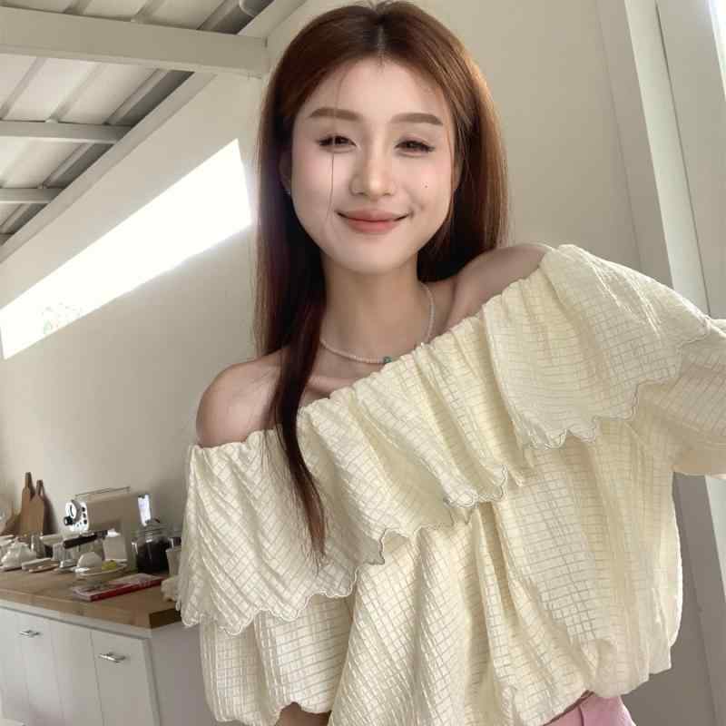 ・スタイル: 私服名媛、御姐風・主な素材: 荷葉辺、皺・袖丈: 無袖・版型: ゆったり・ネックライン: 一文字・袖型: ラッパ袖・カラー展開: 杏色・サイズ展開: S、M、L、XL、2XL・カテゴリ: シャツ