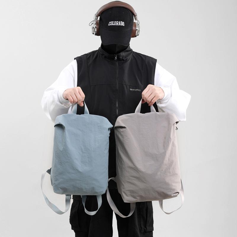 バックパック 男女兼用 学生用 通勤 通学 旅行 軽量 ナイロン 15インチ PC収納 20-35L 容量 純色 竹青緑 白灰色 深空灰 黒 水色 イエロー ベージュ 春季 メンズ レディース ユニセックス シンプル 都市スタイル 日常使い 肩掛け 背負