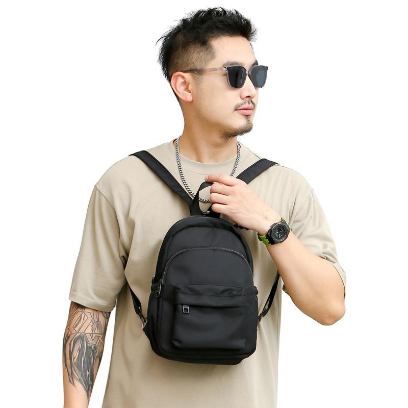 バックパック 男女兼用 小型 防水 ナイロン 20L以下 10インチ収納 都市 カジュアル 旅行 通勤 サイドポケット 水筒入れ 黒 純色 ステッチ 軽量 日常使い