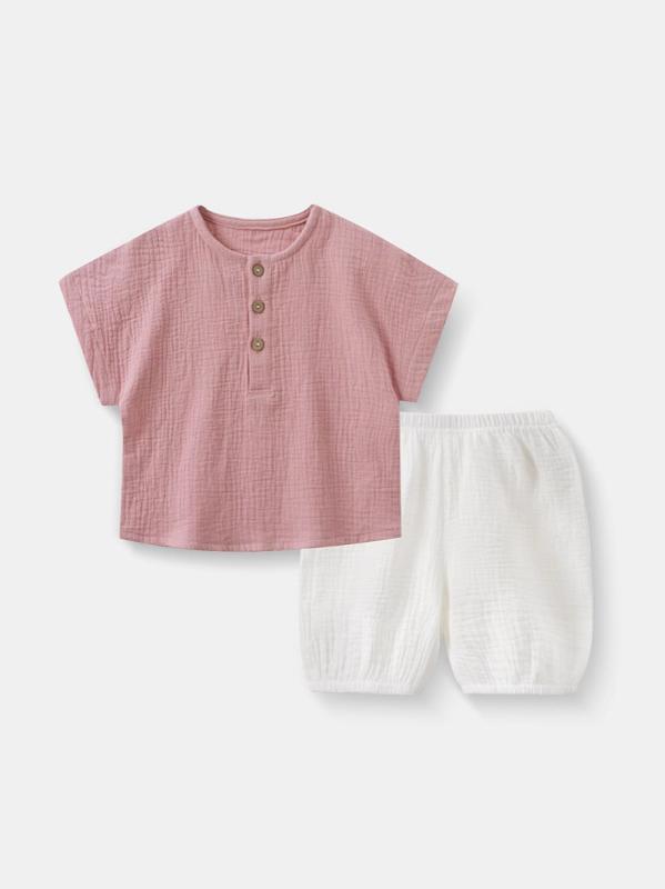 Rakuten - ベビー キッズ 短袖 セット 上下 綿 ガウジ 生地 吸汗 透気 薄手 夏用 ピンク ホワイト セット かわいい 無地 柄 短パン 組み合わせ 快適 部屋着 普段使い 軽量 ソフト 肌触り 安全 規格 セットアップ トップス ボトムス 組み合わせ ゆった