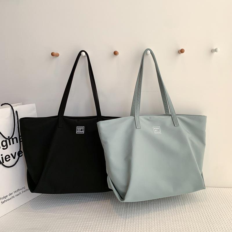 トートバッグ レディース 鞄 帆布 ナイロン 通勤用 大容量 防水 軽量 肩掛け 普段使い カジュアル シンプル・カラー: パープル、グリーン、ブルー、ブラック、ピンク・スタイル: ストリート・素材: ナイロン・バッグのトレンドスタイル: トートバッグ・サイズ: 大・流行の要素: プリント・裏地の質感: ポリエステル・バッグの形状: 横型スクエア・開閉方式: ファスナー・内部構造: ファスナー隠しポケット、スマホポケット、証明書入れ、仕切りファスナーポケット・硬さ: ソフト・外ポケットの種類: オープンポケット・仕切り: あり・ショルダーストラップの本数: 2本・用途: カジュアルトラベル