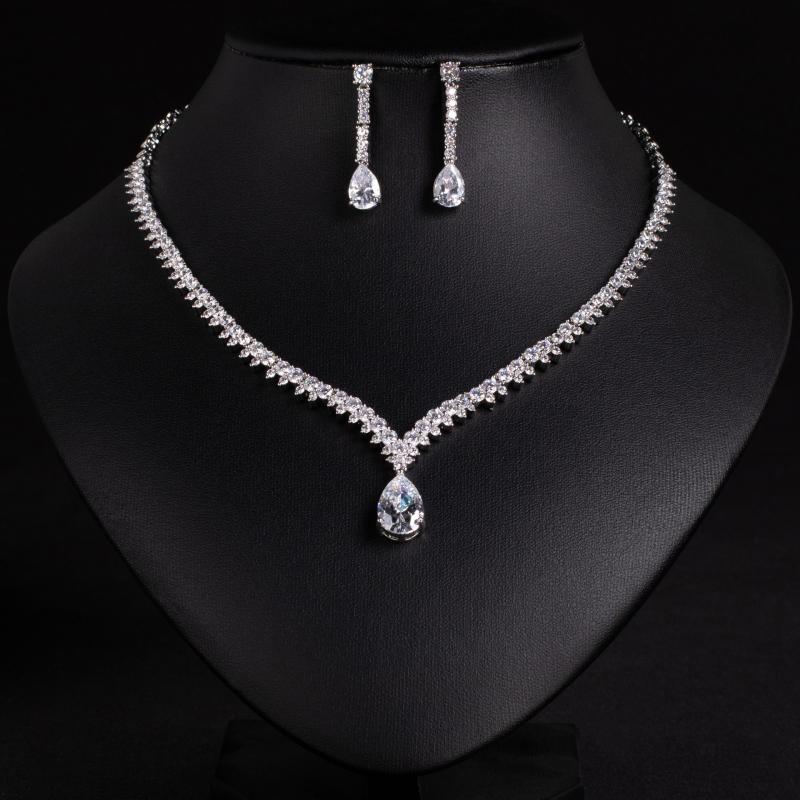 Women's Jewelry Set: Waterdrop Pendant Zirconia Necklace and Earrings. Simple, everyday, wedding, and decorative piece with bamboo chain, heart, waterdrop, and bell motifs. Available in green, blue, and platinum. Luxurious and fashionable for commuting and summer.