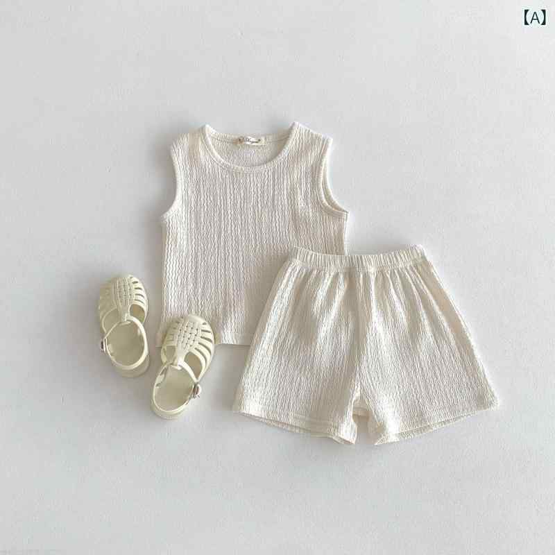 ・カテゴリ: 子供服・スタイル: 韓国風・セット内容: トップスとショーツ・対象: 男女・対象年齢: 3〜8歳・袖丈: ノースリーブ・パンツ丈: ショート・加工: 柔らか仕上げ・厚み: 薄手・柄: 無地・トップス: プルオーバー・主な素材: 綿95%・カラー展開: 米白色、青・サイズ展開: 80、90、100、110、120、130