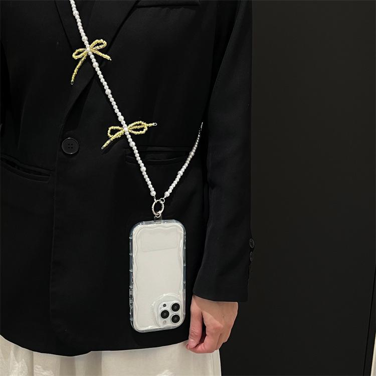スマホ ストラップ ハンドストラップ ショルダーストラップ ネックストラップ バタフライ結び デザイン 真珠 装飾 チェーン 素材 鋼線ロープ 金属 バックル 黄色 ピンク 緑 色展開 かわいい 韓国風 日常使い 百搭 スタイル