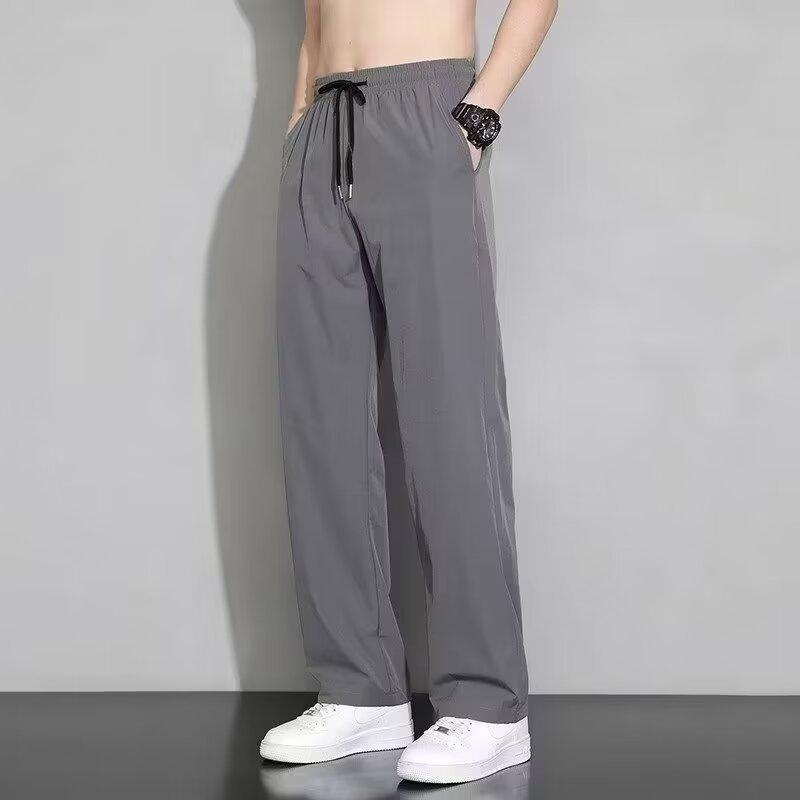 乐天商城 - トップス メンズ 夏 薄手 快適 接触冷感 涼しい ズボン 男性 紳士用 トレンド おしゃれ ゆったり ストレートパンツ カジュアルパンツ 薄い 通気性 快適性 部屋着 普段使い スポーツ 運動 快適素材 ポリエステル 灰色 黒 青年用 大人用 男性用