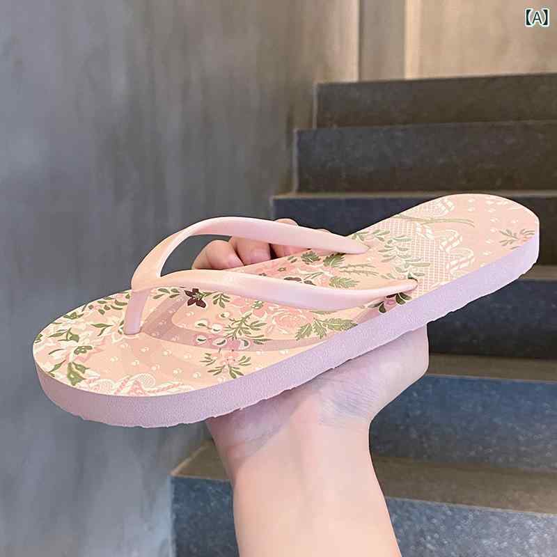 外国 貿易の 花の 人の 字は 女性の スリッパの 夏の 新型の 砂浜の 靴の サンダルの 女性の 百 合の 板の 靴の サンダルを 引っ張ります。