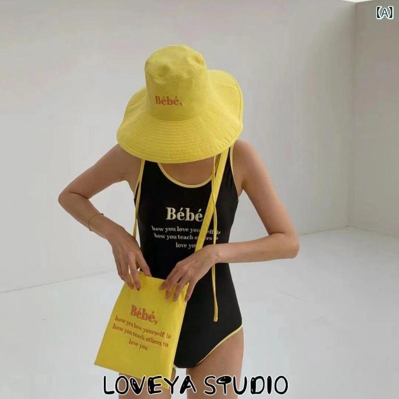 国境を 越えた 韓国の 卸売り bebe レ トロで シンプルな アルファベットの 衝突 色の 連体の スリムな 水着の 女性の 水着