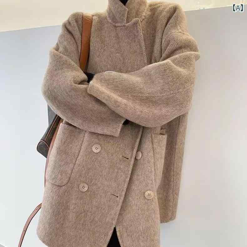 秋冬の ハイエンドの 柔らかい モチ モチと した ショート タイプの 両面の カシミヤの コートの 女性は ゆったり して いて 高級 感が あります。