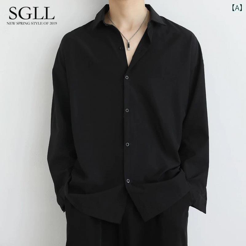 新しい 黒い シャツの 男性の 長袖の 韓国 版の ファッションの 格好が 良いです。