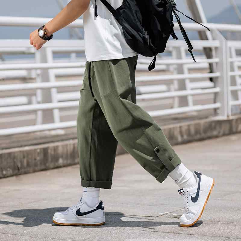 ロングパンツ メンズ カジュアルパンツ カーゴパンツ ストレートパンツ ワークパンツ 長パンツ 脚口アレンジ 2way デザイン性 オールシーズン・スタイル: 港風・種類: 工装パンツ・シルエット: ルーズ・丈: ロングパンツ・ウエスト: ミドルウエスト・厚さ: 薄手・柄: 無地・誤差範囲: 1-3cm・素材: 綿100%・用途: カジュアル・裾の形: ストレート・デザイン: マルチポケット・伸縮性: 微弾性・生地: ツイル・カラー展開: カーキ、ブラック、軍緑色・サイズ展開: M、L、XL、XXL、XXXL・対象年齢: 大人・性別: 男性・カテゴリー: カジュアルパンツ