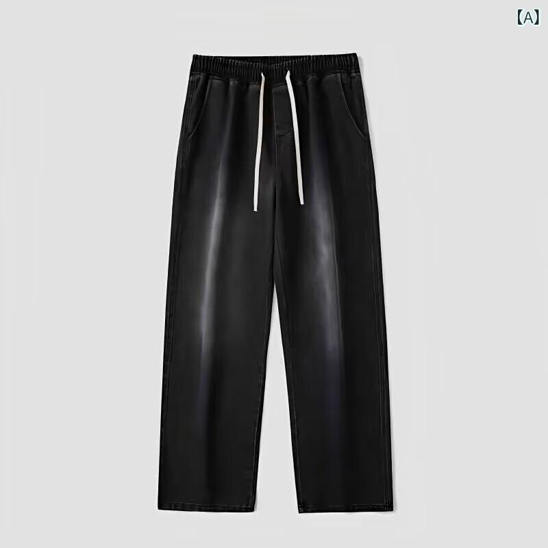 デニムパンツ風のストレートシルエット水洗い加工が施されていますミッドライズ.ドローストリング仕様男性向け.ブラックカラー