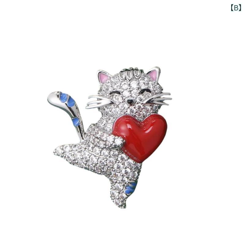ブローチ レディース 猫モチーフ かわいい ハート抱っこ 胸元ピン 飾り アクセサリ...