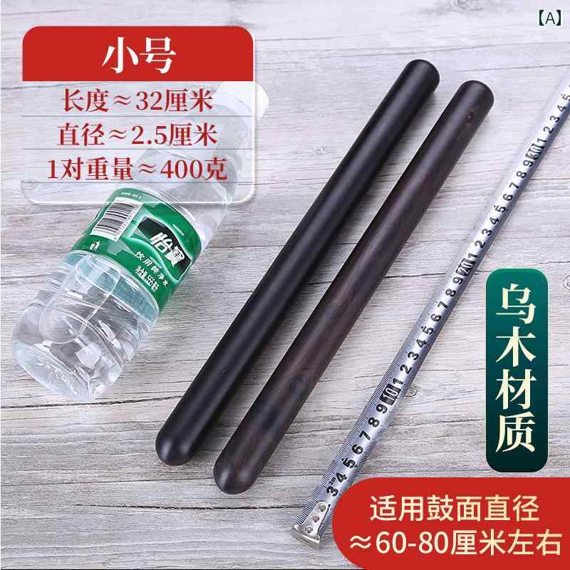 フロントップ楽天市場店の太鼓 バチ 鼓棒 ドラム スティック 木製 無垢材 黒檀 耐久性 イベント 余興 演奏 パーフォーマンス 音楽隊 大太鼓 打楽器 道具｜アングル2