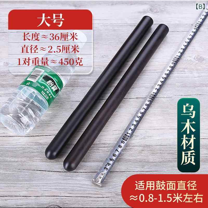 フロントップ楽天市場店の太鼓 バチ 鼓棒 ドラム スティック 木製 無垢材 黒檀 耐久性 イベント 余興 演奏 パーフォーマンス 音楽隊 大太鼓 打楽器 道具｜アングル3
