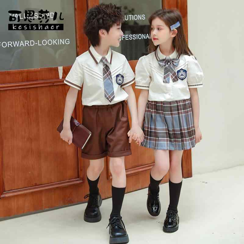 制服風 衣装 キッズ 半袖 春夏 男の子 女の子 上下セット シャツ 前開き 刺繍 ショートパンツ ポケット ウエストゴム ミニスカート プリーツ チェック柄 ネクタイ リボン ワッペン ソフト おしゃれ 発表会 アイボリー 青