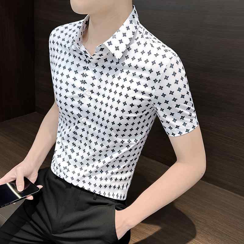 衿タイプ：ポインテッドカラー（レギュラー）適用季節：夏袖丈:半袖厚さ: 薄手フィット: スリムフィット服の詳細: プリント生地の機能: 吸湿性と通気性素材構成：ポリエステル繊維92.5 ポリウレタン弾性繊維(スパンデックス)7.5