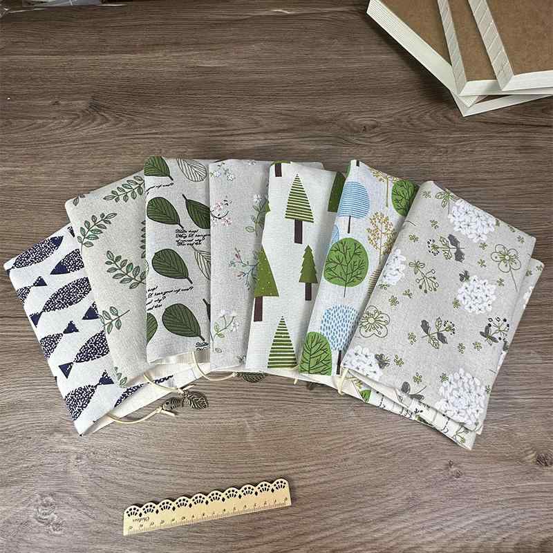 ブックカバー A5 布 リネン しおり紐 チャーム 厚さ調整可能 手帳 日記 書籍保護 おしゃれ ナチュラル 花柄 星 魚 プレゼント 誕生日