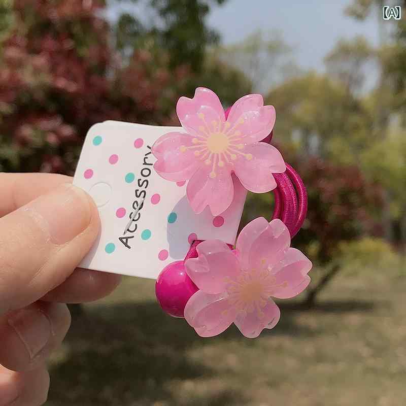 フロントップ楽天市場店のヘアゴム 女の子 キッズ 春夏 桜 ピンク フラワー 夜光 ポニーテール お団子 三つ編み ヘアアレンジ 髪飾り かわいい おしゃれ｜アングル2