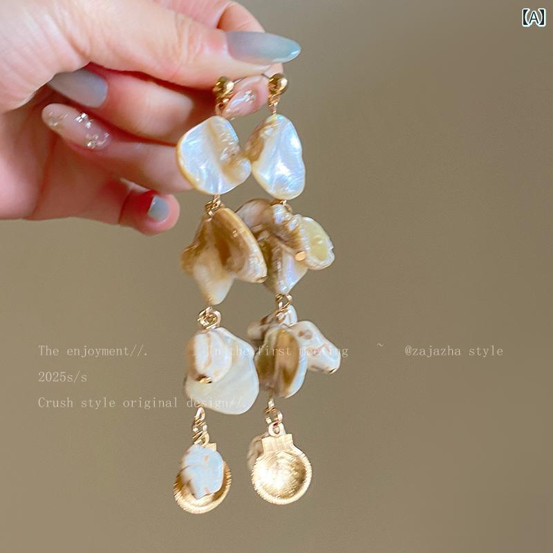 - - 新奇性: 新発売 - 商品タイプ: アクセサリー - 多層構造: なし - チェーン - 柄: - - カラー: ナチュラルシェル（イヤリング）.ブルーシェル（イヤリング）.ナチュラルシェルブレスレット.ブルーシェルブレスレット.シェル＆ヒトデネックレス.ブルーシェルネックレス - 性別: レディース - ペンダント付き: なし - : あり