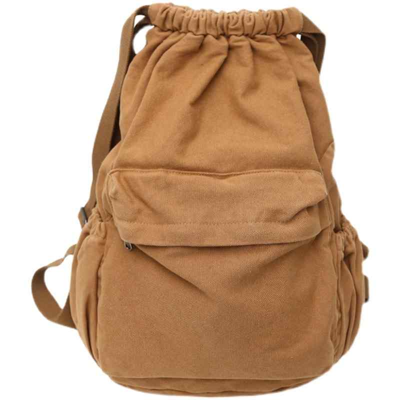 リュックサック おしゃれ カジュアル 束口 ポケット ウォッシュド綿 キャンバス 無地 ルーズ カジュア..