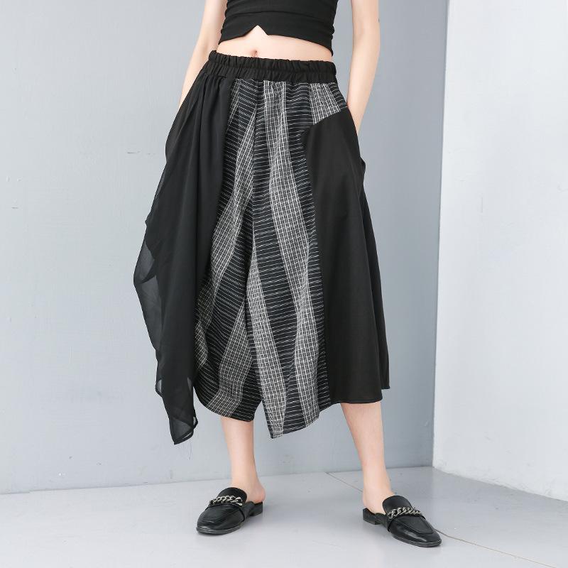 Rakuten - スカートパンツ レディース ワイドパンツ 切り替え シフォン ウエストゴム ゆったり 大きいサイズ 細見え アシンメトリー ストリートファッション 欧米風 ミドルウエスト 七分丈 コットン 春夏 黒