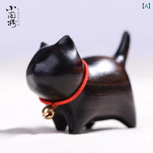 楽天フロントップ楽天市場店置物 黒猫 子猫 木彫り オブジェ 黒檀 緑檀 かわいい 手作り ハンドメイド インテリア 癒し系 掌玩飾り 握り物 机上 書斎 リビング 玄関 デスクトップ リラックス 飾り物 ナチュラル 木工品 愛らしい 動物モチーフ コレクション