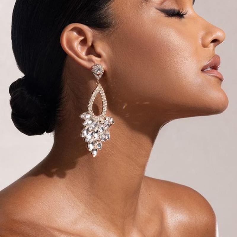 ピアス レディース 耳飾り オーバル 楕円 幾何学 ジオメトリック ラインストーン ジルコニア 透かし彫り 電気メッキ加工 ホワイト ブルー ゴールド キラキラ 大ぶり 秋冬 通勤 パーティー 結婚式 アクセサリー