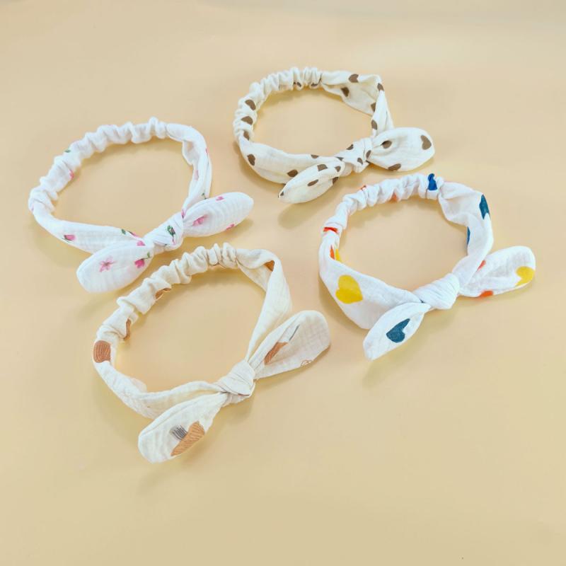 ・カテゴリ: ヘアアクセサリー・種類: ヘアバンド、カチューシャ・スタイル: シンプル・: リボン・素材: 布・柄: 無地、プリント・対象年齢: 0-3歳・サイズ: 平置き時 約20cm・カラー展開: ピンク、ブラウン、ホワイト、グレー、オレンジ、グリーン、ブルー、パープル、イエロー、レッド