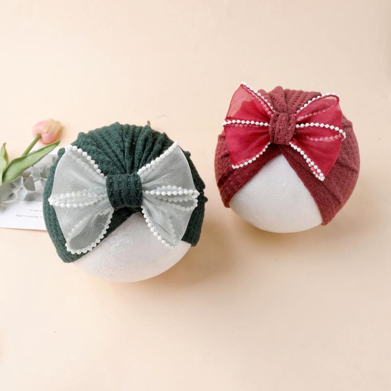 ・カテゴリ: ニット帽・カラー展開: グリーン、ライトピンク、ワインレッド、グレー、ターメリック・サイズ展開: フリーサイズ・つばの形状: つばなし・帽子の形状: 丸型・機能: 通気性、保温性・主な素材: ポリエステル