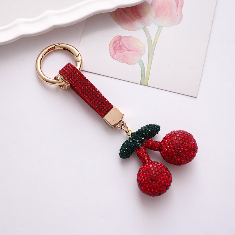キーホルダー レディース メンズ チェリー さくらんぼ ラインストーン ジルコニア バッグチャーム 鍵 鞄 車用 高級感 亜鉛合金 赤 レッド かわいい 上品 華やか 普段使い 通勤 落下防止 アクセサリー ストラップ