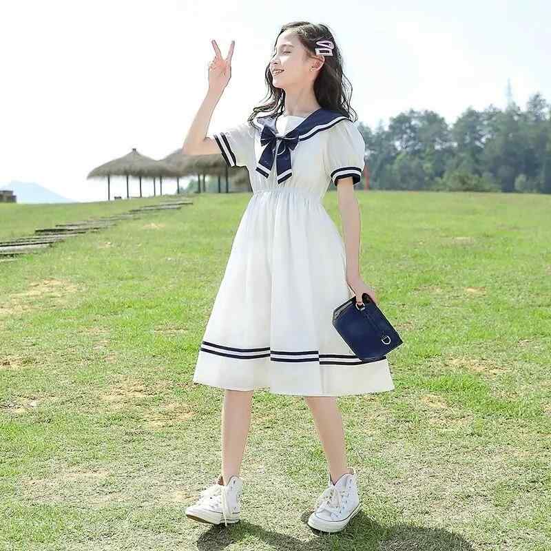 樂天商城 - ワンピース 女の子 キッズ 夏 半袖 パフスリーブ リボン プリンセスドレス Aライン スクールスタイル かわいい おしゃれ 通学 お出かけ 発表会 子供服 ジュニア 白 ネイビー コットン ポリエステル 110cm-170cm