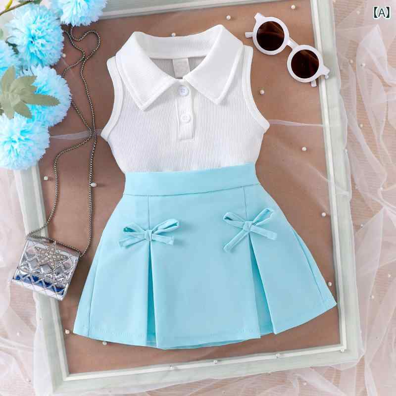 ・カテゴリ: 子供服セットアップ・対象: 女の子・スタイル: カジュアル、欧米スタイル・セット内容: スカートセット（2点セット）・対象年齢: 1〜3歳（80〜100cm）・袖丈: ノースリーブ・生地加工: ソフト加工・柄: 無地・要素: リボン・素材: 綿65%・カラー展開: ライトブルー・サイズ展開: 6-9M, 9-12M, 12-18M, 18-24M, 2-3Y