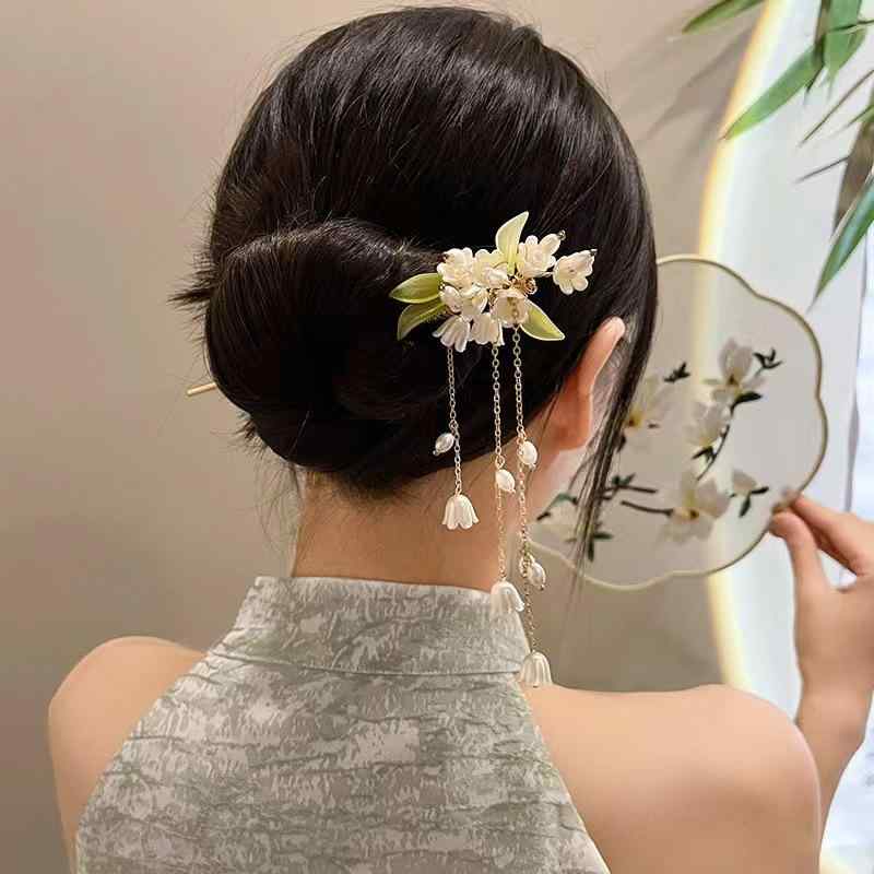 ・素材: 合金・スタイル: 古風・カテゴリ: ヘアアクセサリー・モチーフ: 花・加工: 塗装・ギフト用途: 誕生日、旅行記念、祝日、記念日、表彰記念・: タッセル・カラー展開: 玉蘭（タッセル付き）、スズラン（タッセル付き・2本差し）、スズラン、桃の花（ピンク）、桃の花（ブルー）