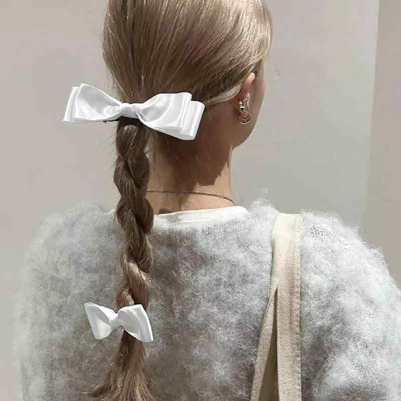 ・カテゴリ: ヘアアクセサリー・素材: リボン・加工: ハンドメイド・クリップタイプ: バレッタ・: リボン・スタイル分類: フェミニン・対象: レディース・セット内容: 大小ペアセット